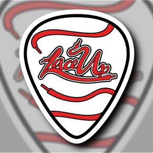 May include: A white guitar pick with a red and black graphic of the word "Lace Up" in a stylized font. The graphic is surrounded by red laces.