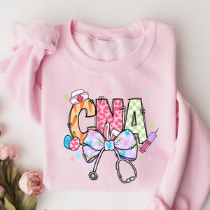Easter Cna Sweatshirt, Cute Bunny Nurse Shirt, Spring Nursing Crewneck, Gift For Nurse, Registered Nurse Sweater, Nurse Easter Cozy Outfit