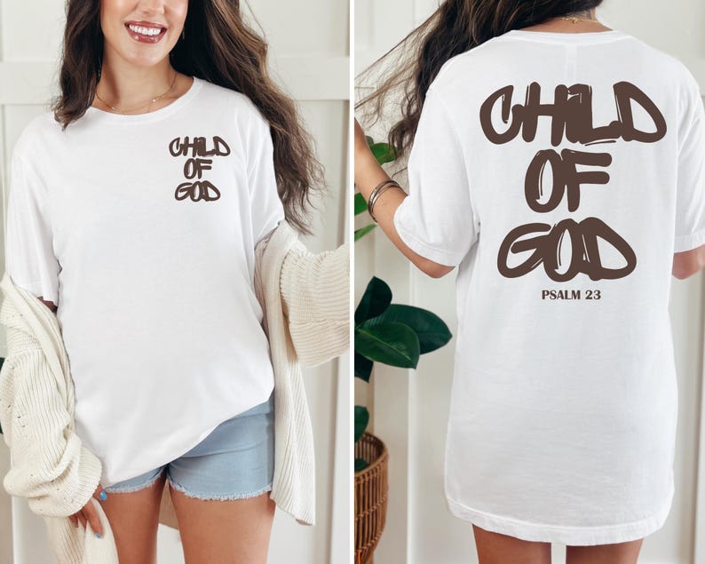 May include: White t-shirt with the text "CHILD OF GOD" in brown on the front and back. The back of the shirt also includes "PSALM 23" in brown. The shirt is a casual, oversized fit.