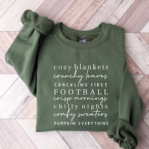 Cozy Blankets Crunchy Leaves Crackling Fires Football Sweatshirt, Fall List Shirt, Womens Halloween Shirt, Thanksgiving Gifts, Autumn Shirt