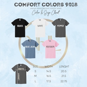May include: Image of a Comfort Colors 9018 unisex heavyweight youth shirt in black, white, pepper, blue jean, and blossom. A colour and size chart is included, with measurements in inches, and the equivalent in cm for width and length for sizes S, M, and L.