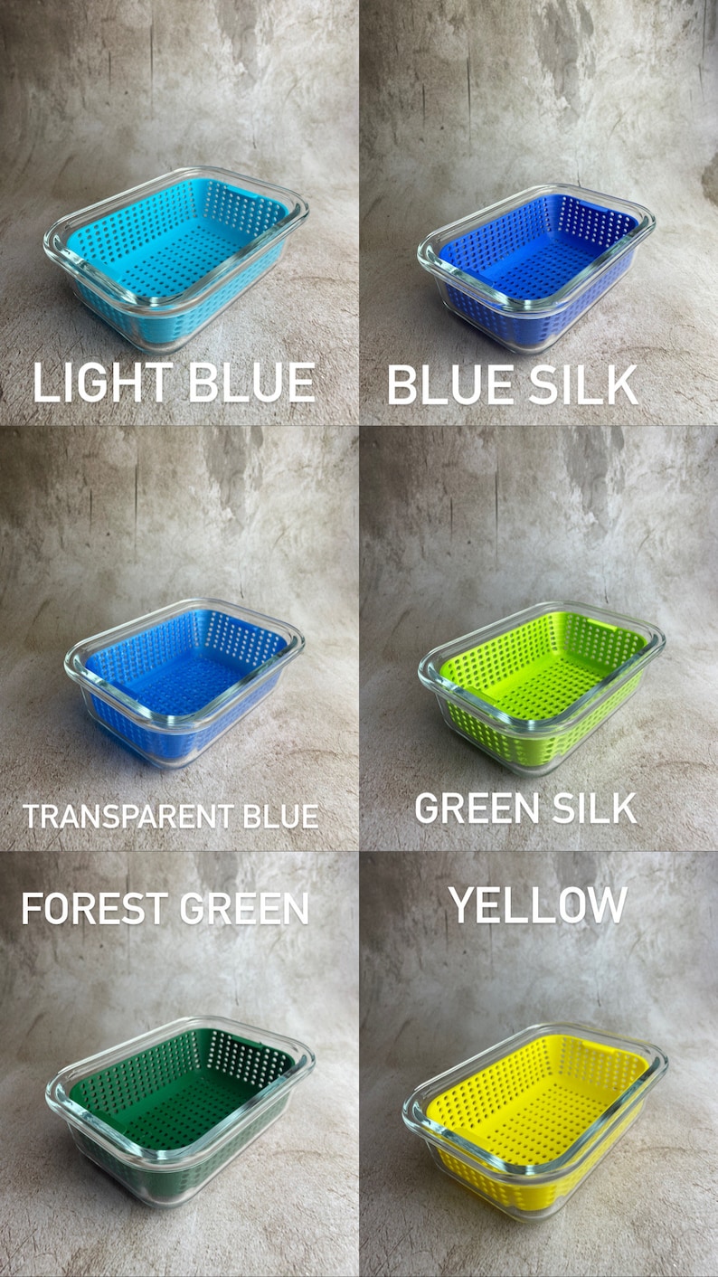 May include: A selection of rectangular food storage containers in light blue, blue silk, transparent blue, green silk, forest green, and yellow. Each container has a clear glass lid and a perforated plastic base. The colour of each container is indicated by text on the image.