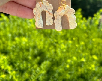 Pendientes de arcilla de arco ondulado