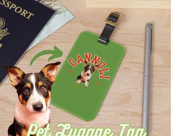 May include: Green luggage tag with a brown leather strap and a gold metal buckle. The tag has a white border and the text "CANNOLLI" in red and white letters. A small image of a dog is in the center of the tag. The text "Pet Luggage Tag" is written in green and white letters below the tag.
