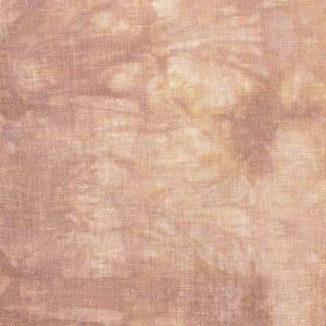 May include: Close-up of a textured fabric with a mottled appearance. The fabric has a blend of light brown and beige hues, with subtle variations in tone creating a soft, cloud-like effect. The weave is visible, suggesting a natural fiber textile.