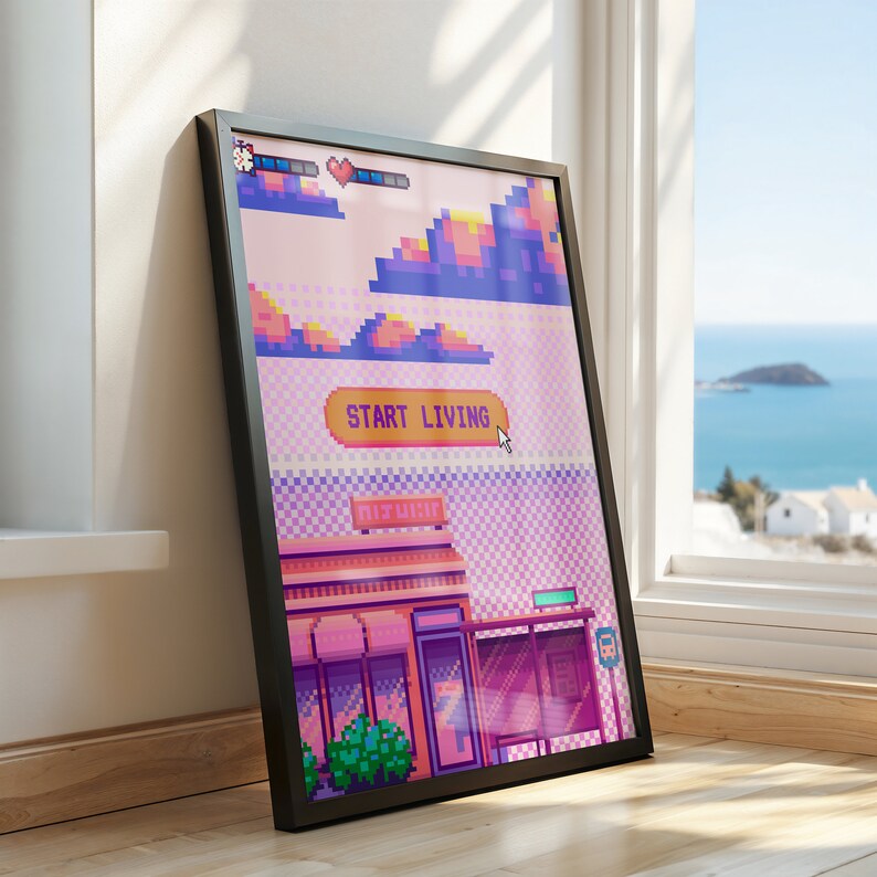 May include: A framed pixel art print with a pink, purple, and blue color scheme. The print features a pixelated cityscape with a building that says "Start Living" and a pixelated sky with clouds.
