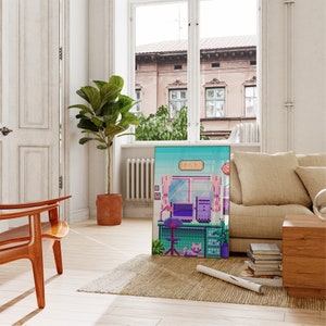 Puede incluir: Una impresi&oacute;n de arte pixelada de una sala de ordenadores con un cartel que dice "Sign In". La impresi&oacute;n est&aacute; enmarcada y colgada en una pared de una sala de estar con un sof&aacute;, una silla y una planta.