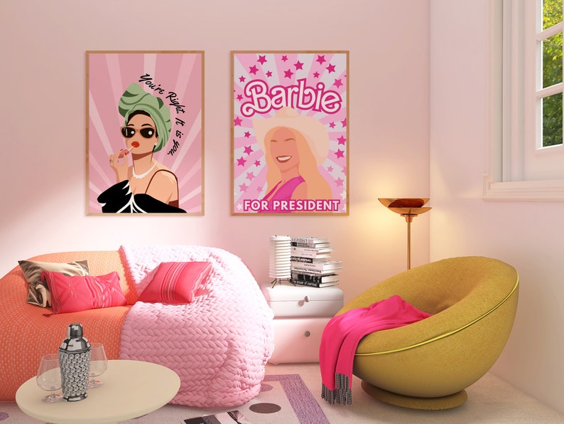 May include: Two framed posters on a pink wall. The poster on the left features a woman with sunglasses and a green turban, with the text "You're Right It is a Big Deal". The poster on the right features a blonde woman with the text "Barbie for President".