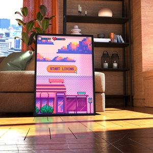 May include: A framed pixel art print with a pink and blue color scheme. The print depicts a city scene with a building that says "Start Living" above the entrance. The print is hanging on a wall in a living room.