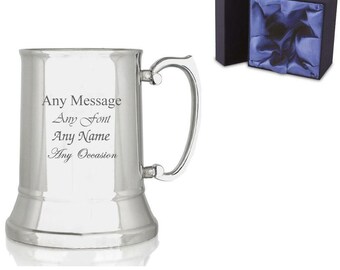 May include: A silver stainless steel beer stein with a handle. The stein has an engraved message that reads "Any Message Any Font Any Name Any Occasion".