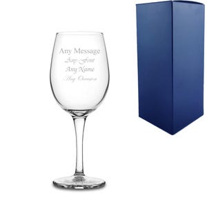 May include: A clear glass wine glass with an engraved message that reads "Any Message Any Font Any Name Any Occasion". The glass is packaged in a blue box.