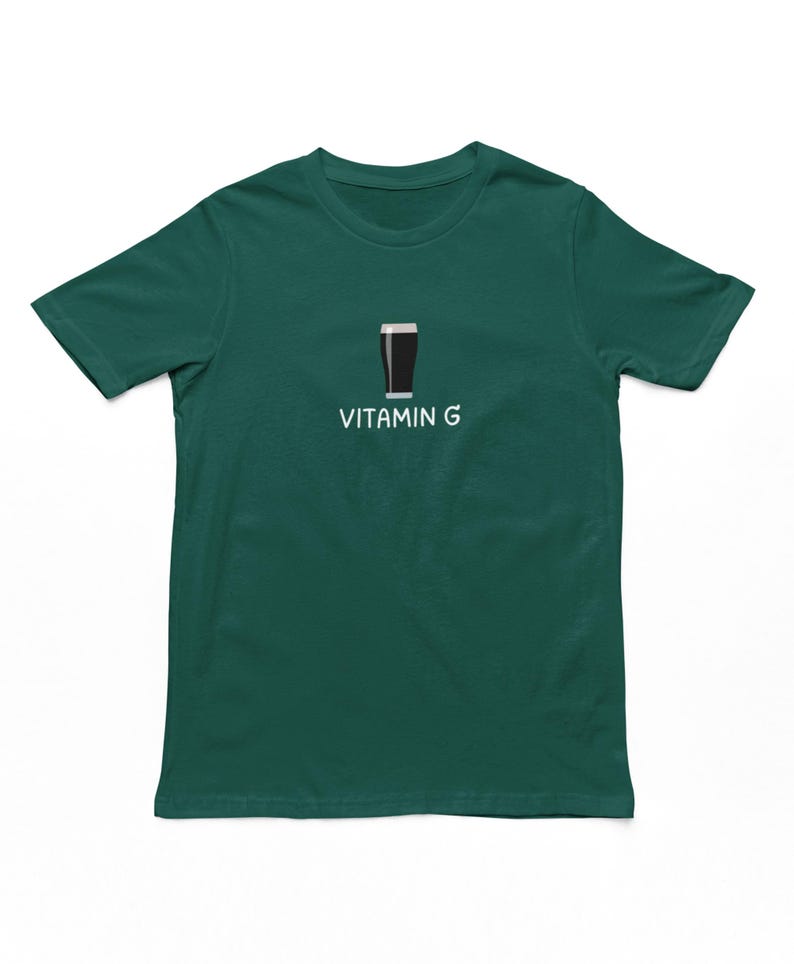 May include: A dark green t-shirt with a white graphic of a glass of beer and the text "Vitamin G".