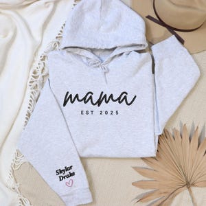 Optional sleeve name embroidery with small heart, additional $5