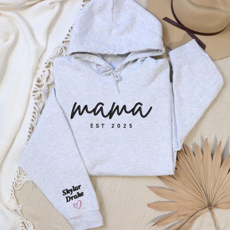 Optional sleeve name embroidery with small heart, additional $5