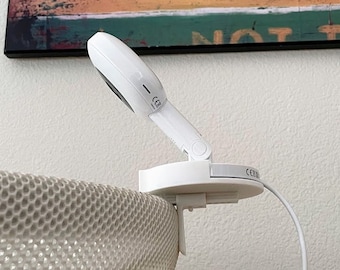 Soporte flexible ajustable Nanit: viajes, cunas, moisés y corrales portátiles