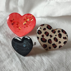 Anillo corazón en resina y purpurina para mujer.