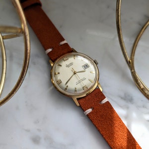 Vintage Isoma Watch Datumvenster Jaren 60 Mechanisch handopwindbaar uurwerk Herenmode en sieraden Ouderwets stuk Verguld afbeelding 2