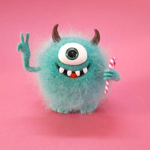 Needle felted cute monster. Wool One-eyed Monster. Funny fantasy creature. Needle felted animals. Needle felted fantasy. Felt fairy monster