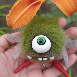 Needle felted cute monster. Wool One-Eyed Monster. Funny fantasy creature. Needle felted animals. Needle felted fantasy. Felt fairy monster.