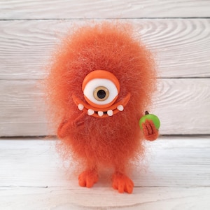Needle felted cute monster. Wool One-Eyed Monster. Funny fantasy creature. Needle felted animals. Needle felted fantasy. Felt fairy monster.