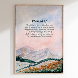 Op de afbeelding: Een aquarel van een berglandschap met een roze en blauwe lucht. De afbeelding bevat de tekst "PSALM 23" en een vers uit de Bijbel.