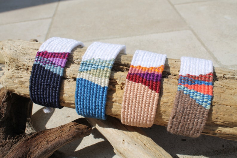 Handwoven bracelet-half white and half ocean blue base with blue, green, beize elements in center image 6