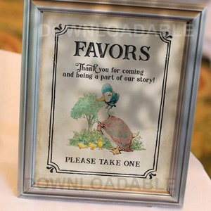 May include: A vintage-style sign with a framed image of a duck wearing a bonnet and dress. The sign says "Favors" and "Thank you for coming and being a part of our story!" with the text "Please take one" at the bottom.