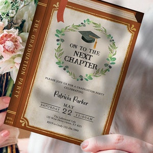 May include: A graduation party invitation with a book-shaped design. The invitation features a watercolor illustration of a graduation cap and a leafy wreath. The text reads "On to the Next Chapter" and includes the date, time, and location of the party. The invitation is decorated with a gold border and a red ribbon.