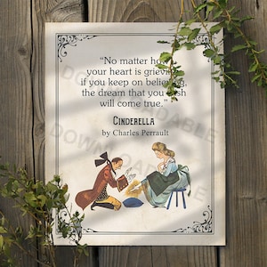 May include: A vintage-style print with a quote from Cinderella: "No matter how your heart is grieving, if you keep on believing, the dream that you wish will come true." The quote is attributed to Charles Perrault. The print features an illustration of Cinderella and a man kneeling before her.