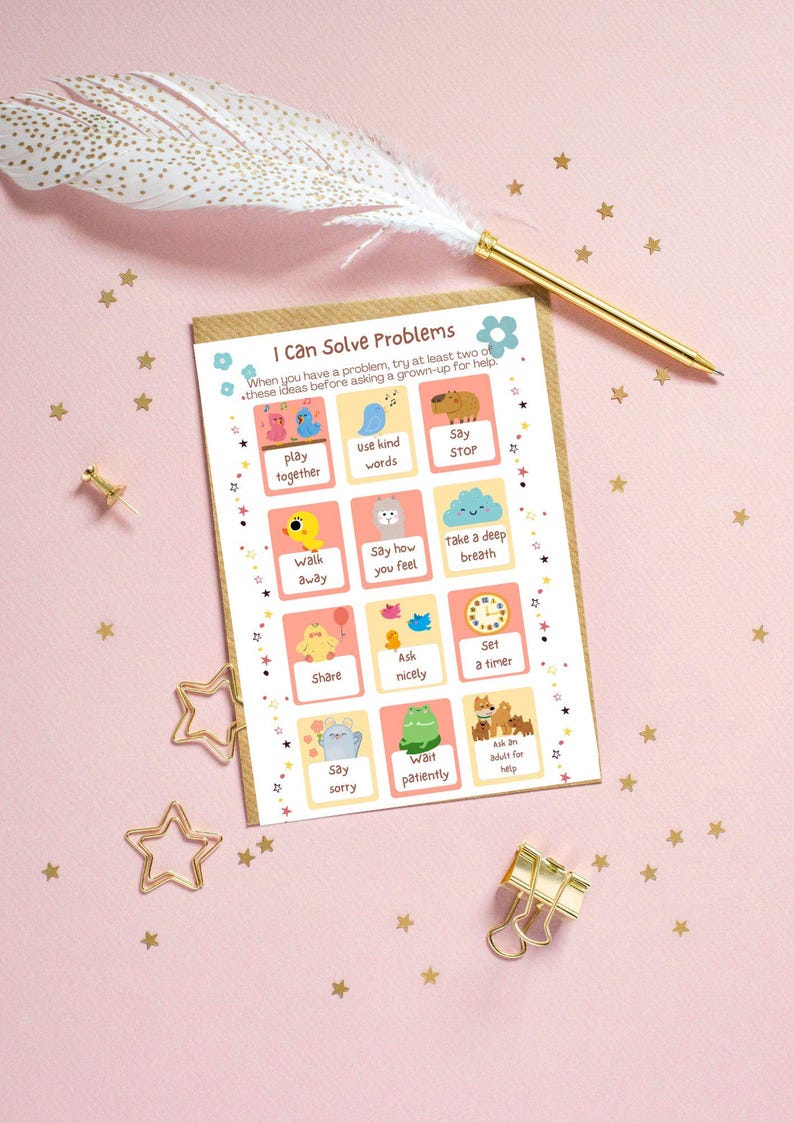 May include: A card with the text "I Can Solve Problems" and illustrated problem-solving steps. The card is on a pink surface with gold star confetti, a gold pen, and a decorative feather.