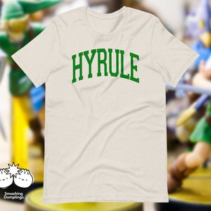 The “Hyrule” Varsity T-Shirt | Zelda, Nintendo, Gamer American College Tee, Sports Shirt, Unisex, Gifts for Him, for Her, for Them
