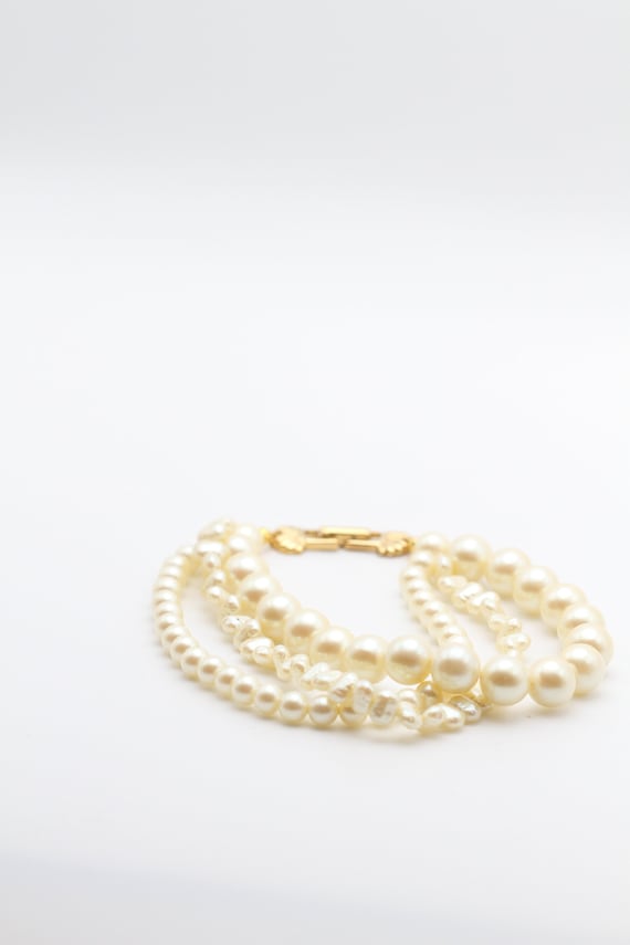 Vintage R faux pearl 3 strand with gold tone clasp