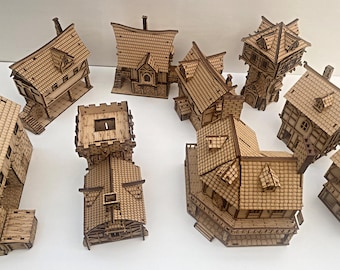 May include: A collection of eight miniature wooden houses with intricate details, including roofs, windows, and doors. The houses are made of light brown wood and have a rustic, handcrafted look.