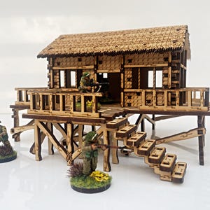 Stillahavskriget/Vietnam Hus Typ 1. Liten byggnad med bambu och halmtak för miniatyrkrigsspel med skärmytslingar (28 mm-32 mm skärmytslingsterräng)