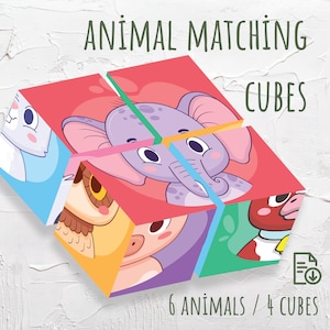Pode incluir: Um conjunto de quatro cubos coloridos com diferentes faces de animais em cada lado. Os cubos estão dispostos em forma de cubo, com a face do elefante na parte superior. O texto "ANIMAL MATCHING CUBES" está na parte superior da imagem, e o texto "6 ANIMALS / 4 CUBES" está na parte inferior.
