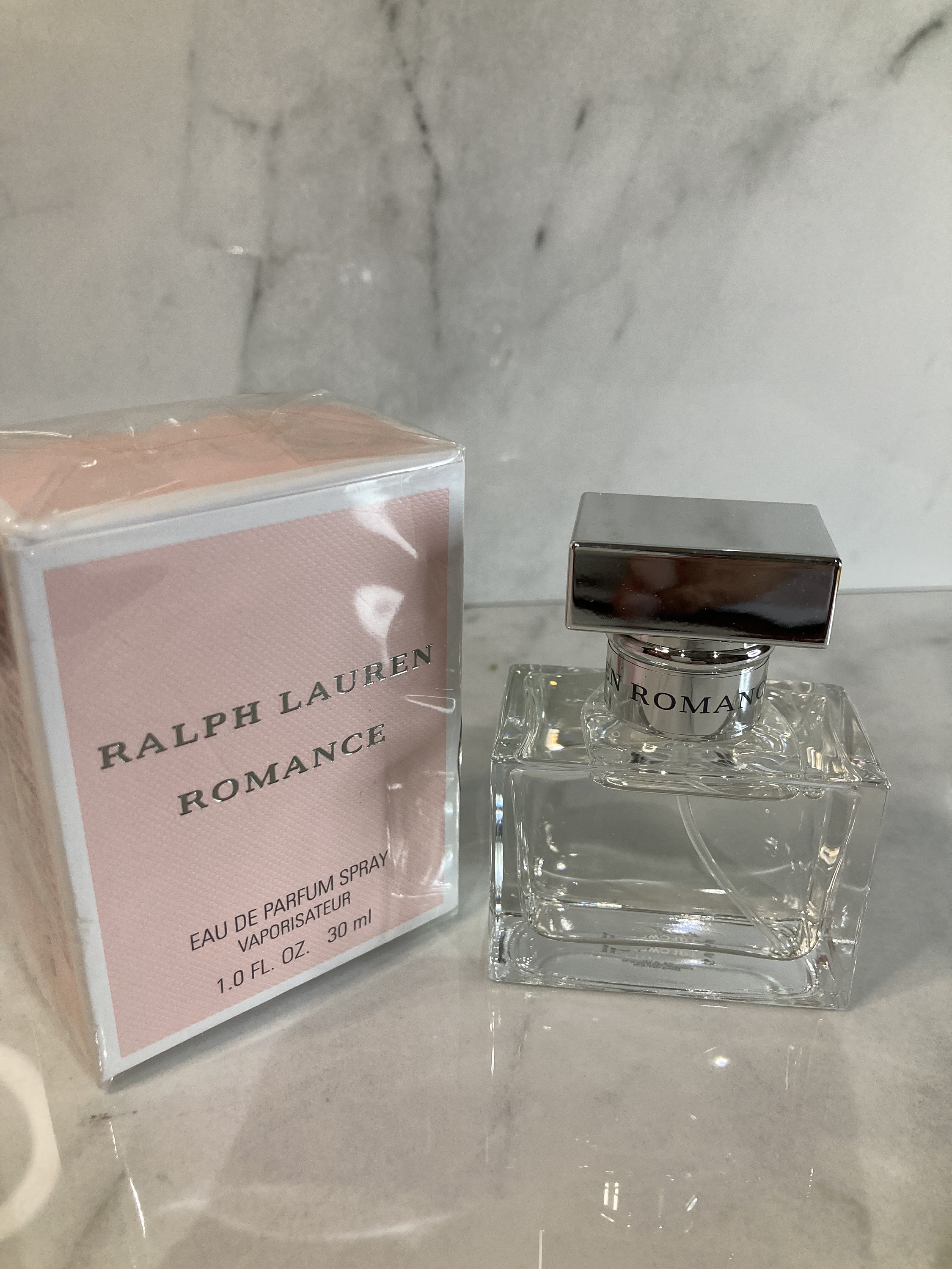 ROMANCE by Ralph Lauren Eau De Parfum Spray 1 oz And a Mystery Name brand  sample vile