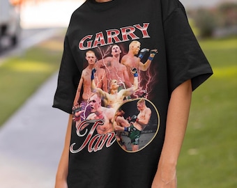 Camiseta retrô oversized estilo anos 90 do Ian Garry, modelo bootleg, ideal para fãs irlandeses de MMA e UFC. Camiseta Ian Garry, campeões de kickboxing e MMA.