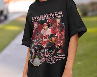 Camiseta Logan Stankoven Carolina Hurricanes Vintage Canes NHL Fan Hockey Design Bootleg Gift Classic Graphic Tee Unissex Edição Limitada
