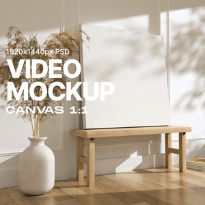May include: A white canvas mockup with the text "1920x1440px PSD VIDEO MOCKUP CANVAS 1:1" on it, sitting on a wooden bench in a room with white walls and a vase with dried flowers.