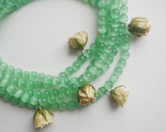 Necklace Harmony | green catʼs eye chrysoberyl stones real rose in epoxy resin