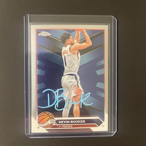 Autógrafo de Devin Booker en tarjeta de baloncesto de los Phoenix Suns