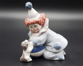 リヤドロのフィギュア「Pals Forever」ピエロと犬たちと少女 1999年