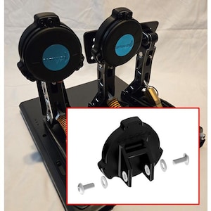May include: A black metal pedal with a black and blue round footpad. The pedal is attached to a black metal base. The pedal is part of a set of pedals. The image also shows a close-up of a black metal pedal with a black footpad and four silver screws.