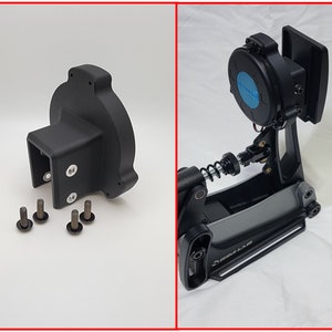 May include: A black drum pedal with a silver base and a black footboard. The pedal has a spring and a black beater with a blue round pad. The pedal is disassembled and the parts are laid out on a white surface.