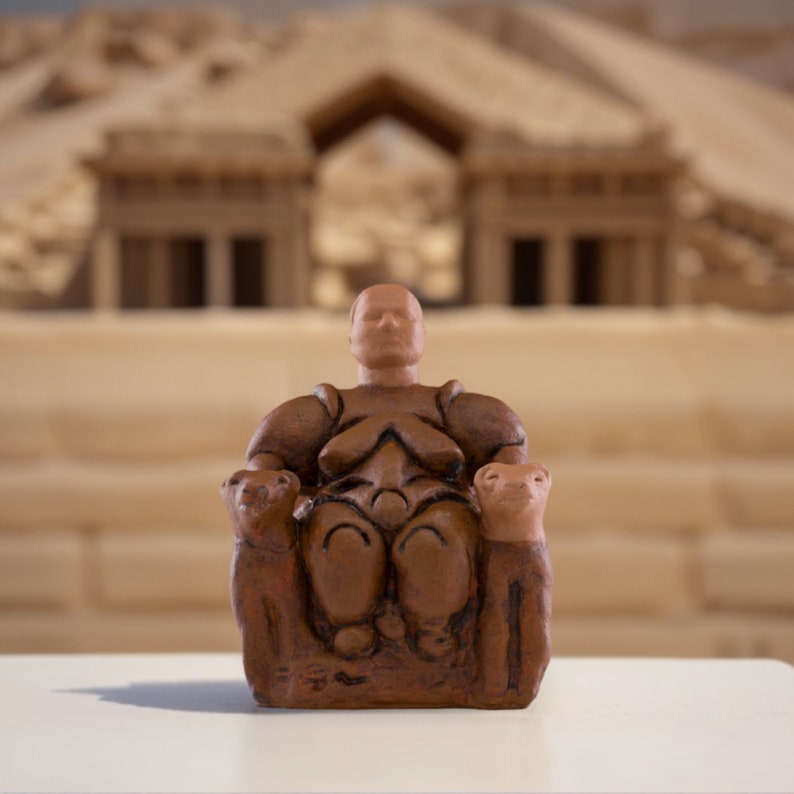 The replica of Çatalhöyük Cybele figure from the Neolithic period, with its chubby features and large breast details symbolizing fertility and abundance