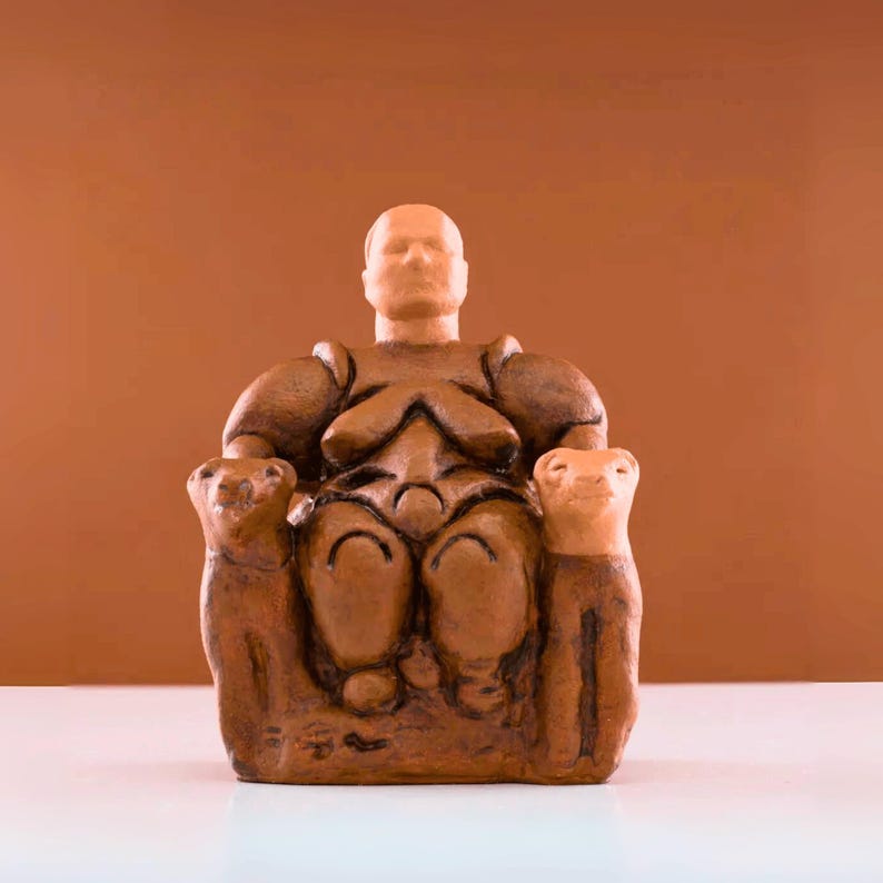 The replica of Çatalhöyük Cybele figure from the Neolithic period, with its chubby features and large breast details symbolizing fertility and abundance