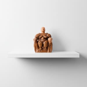 Front view of the Cybele Mother Goddess Statue by ArkeoArt under soft studio lighting. This handcrafted Neolithic fertility idol, inspired by the Çatalhöyük Mother Goddess, symbolizes abundance, motherhood, and ancient Anatolian spirituality. A museum-quality archaeological replica connecting modern art collectors with prehistoric creativity.