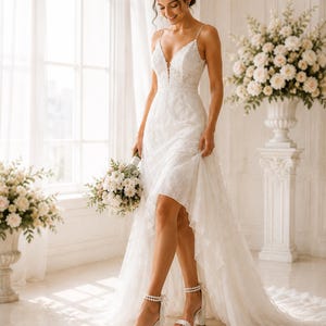 Bride walking in white bridal sandals with pearl ankle straps and comfortable block heels.
