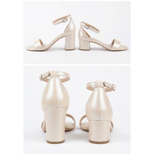 Heel height comparison chart for ivory bridal sandals, showing side and back views with 8 cm (3.15 in) and 5 cm (1.97 in) block heels.