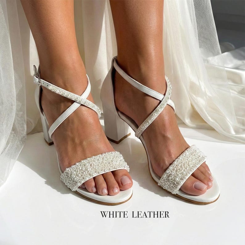 Timeless bridal ivory sandals handmade in Greece with pearl trim and secure elegant fit.
